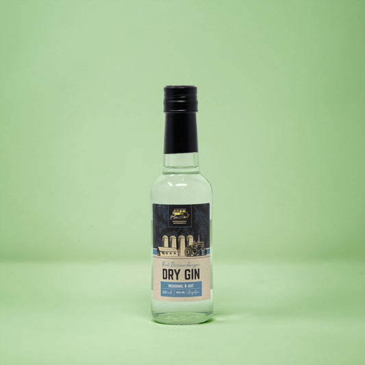 Frontalansicht von Bad Duerrenberger Dry Gin 200 Milliliter in einer Glasflasche mit Etikett.