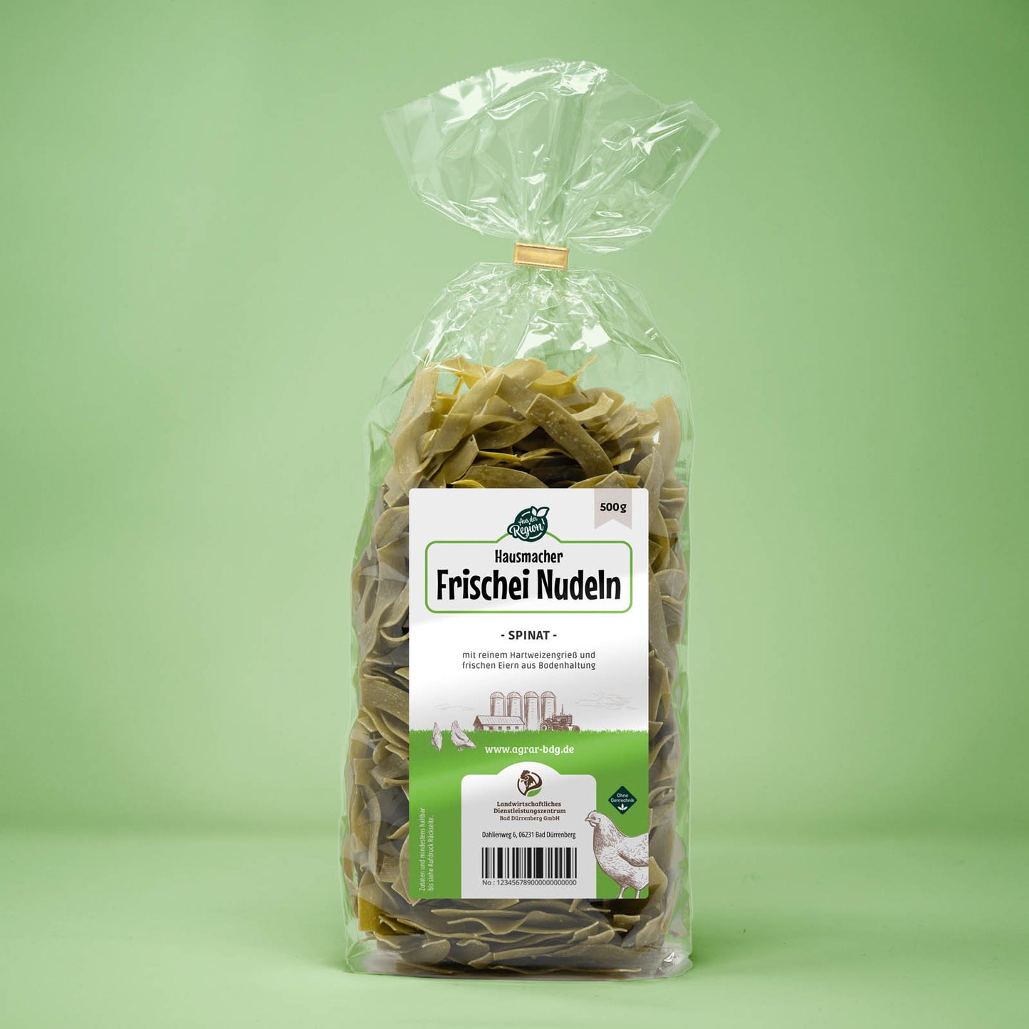 Frontalansicht von Hausmacher Frischei Spinat Nudeln 500 Gramm in einer Plastiktüte mit Etikett.