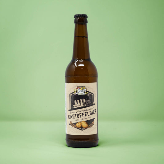 Frontalansicht von Bad Duerrenberger Kartoffelbier 500 Milliliter in einer Glasflasche mit Etikett.