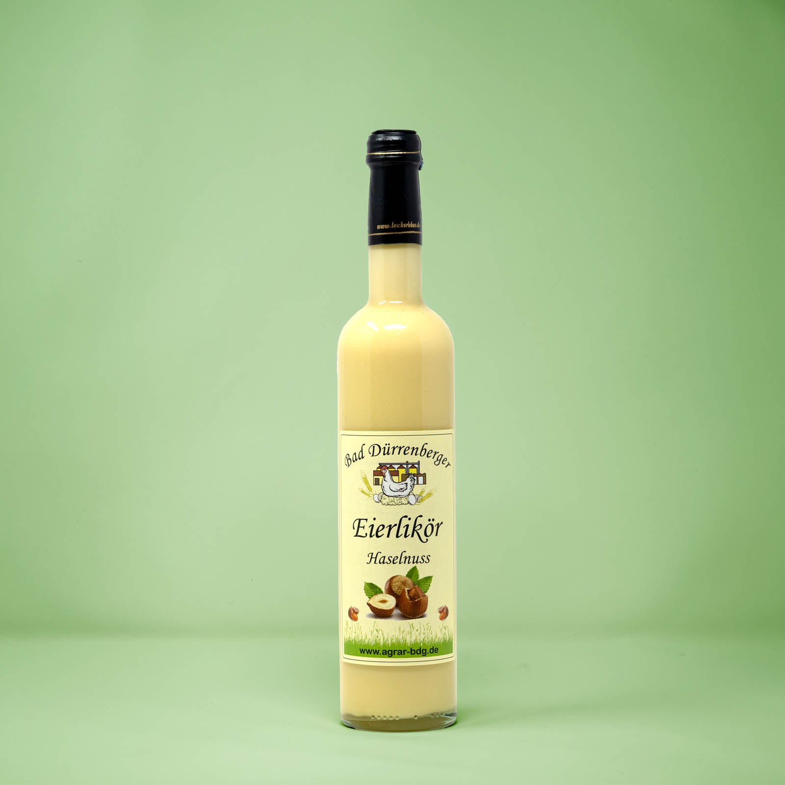Frontalansicht von Bad Duerrenberger Eierlikoer Haselnuss 500 Milliliter in einer Glasflasche mit Etikett.