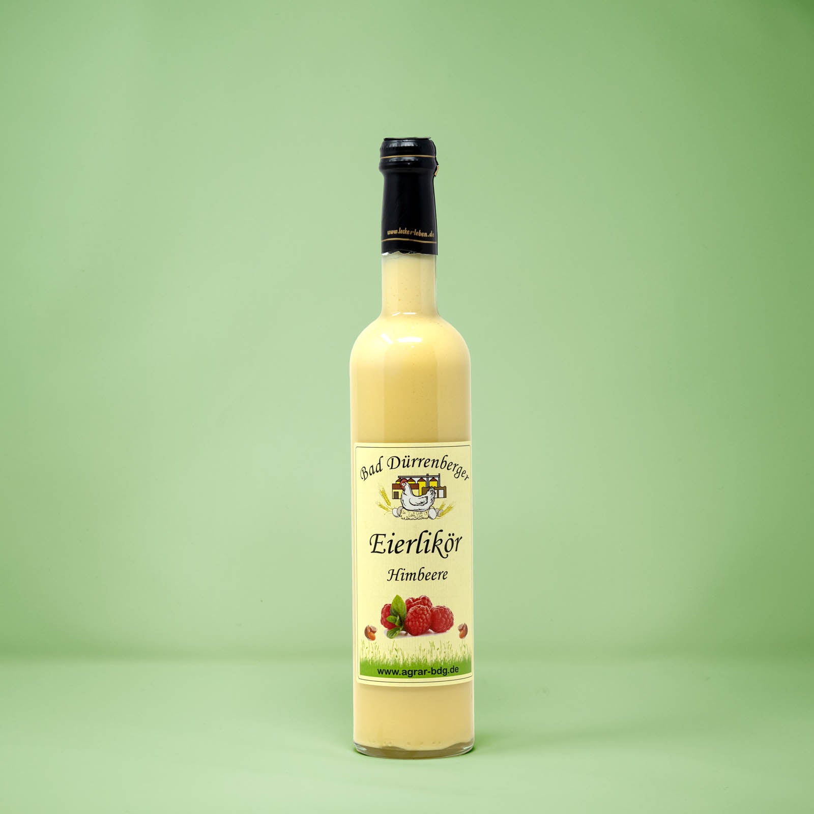 Frontalansicht von Bad Duerrenberger Eierlikoer Himbeere 500 Milliliter in einer Glasflasche mit Etikett.