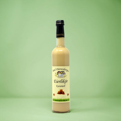 Frontalansicht von Bad Duerrenberger Eierlikoer Karamell 500 Milliliter in einer Glasflasche mit Etikett.