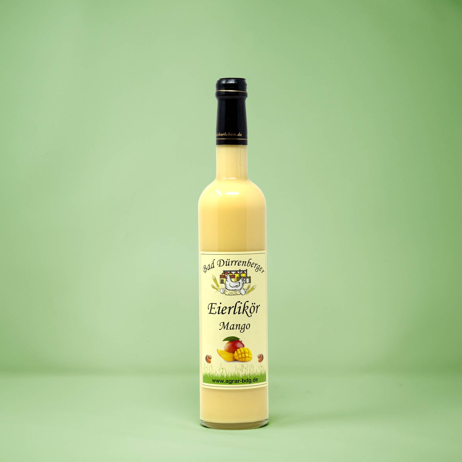 Frontalansicht von Bad Duerrenberger Eierlikoer Mango 500 Milliliter in einer Glasflasche mit Etikett.