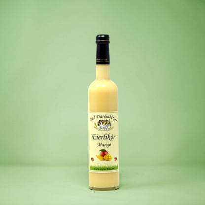 Frontalansicht von Bad Duerrenberger Eierlikoer Mango 500 Milliliter in einer Glasflasche mit Etikett.
