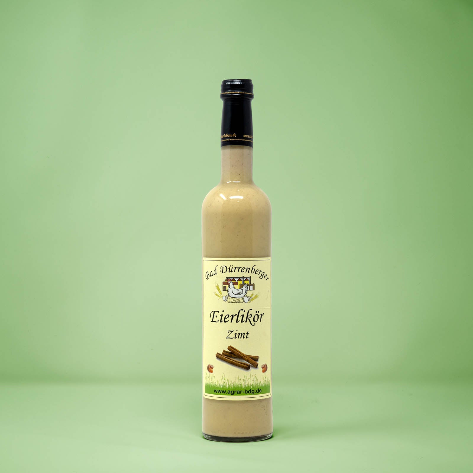 Frontalansicht von Bad Duerrenberger Eierlikoer Zimt 500 Milliliter in einer Glasflasche mit Etikett.