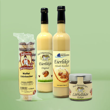 Inhalt des Genuspakets Kuechenfreude. Von links nach rechts: Waffelbecher, Original Eierlikoer, Salted Caramel Eierlikoer.