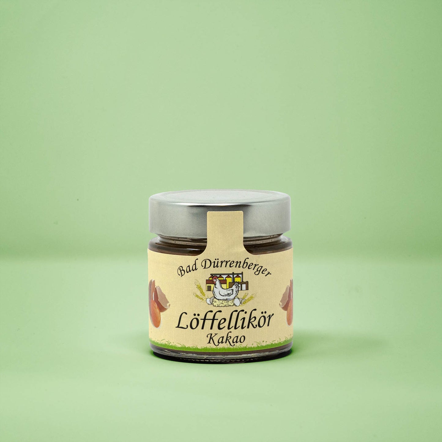 Frontalansicht von Bad Duerrenberger Loeffellikoer Kakao 200 Milliliter in einem Glas mit Etikett.