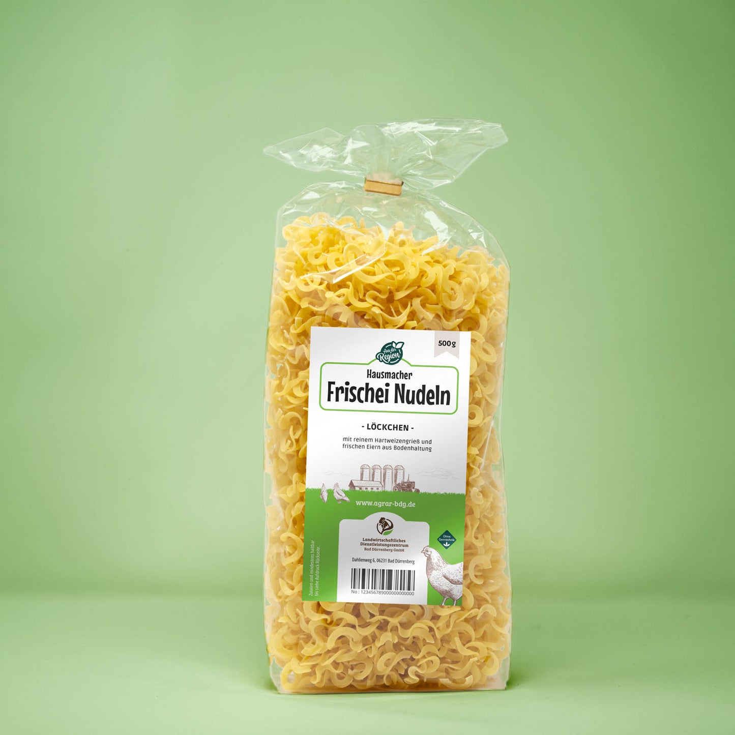 Frontalansicht von Hausmacher Frischei Loeckchen Nudeln 500 Gramm in einer Plastiktüte mit Etikett.