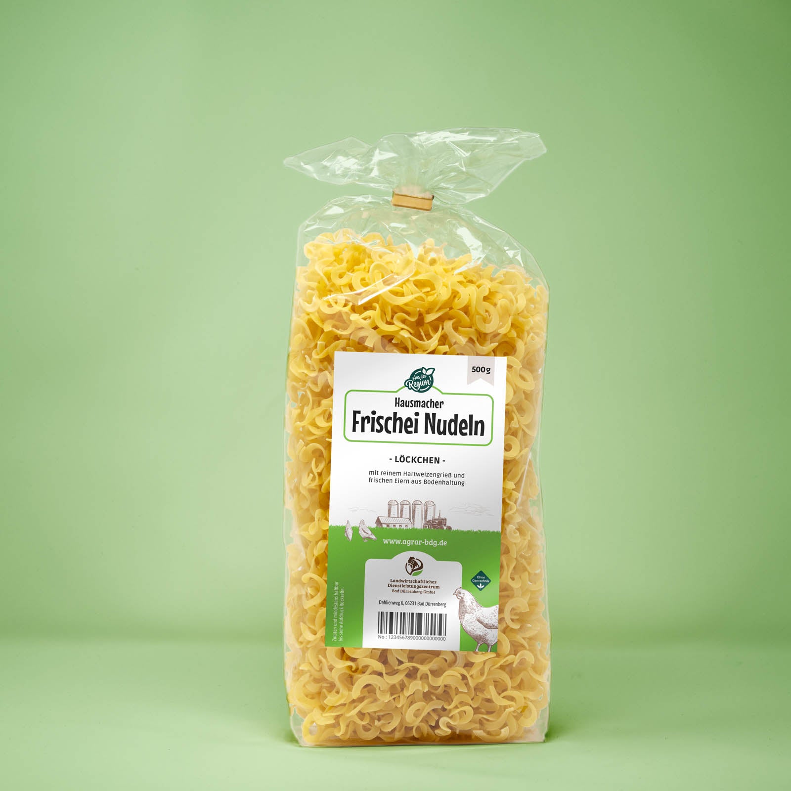 Frontalansicht von Hausmacher Frischei Loeckchen Nudeln 500 Gramm in einer Plastiktüte mit Etikett.