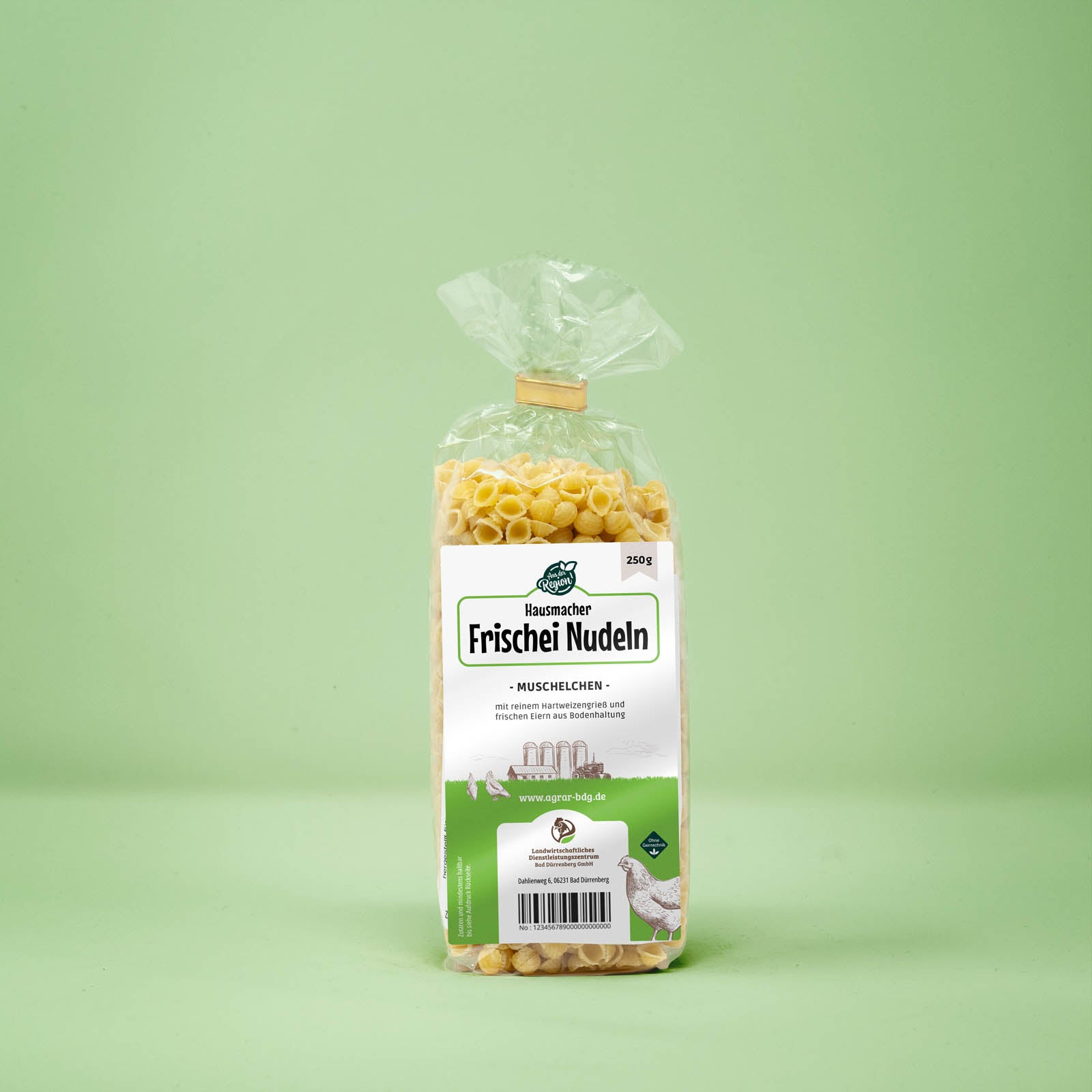 Frontalansicht von Hausmacher Frischei Muschelchen Nudeln 250 Gramm in einer Plastiktüte mit Etikett.