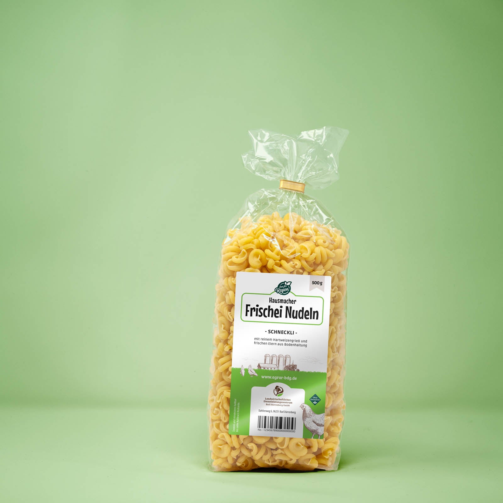 Frontalansicht von Hausmacher Frischei Schneckli Nudeln 500 Gramm in einer Plastiktüte mit Etikett.